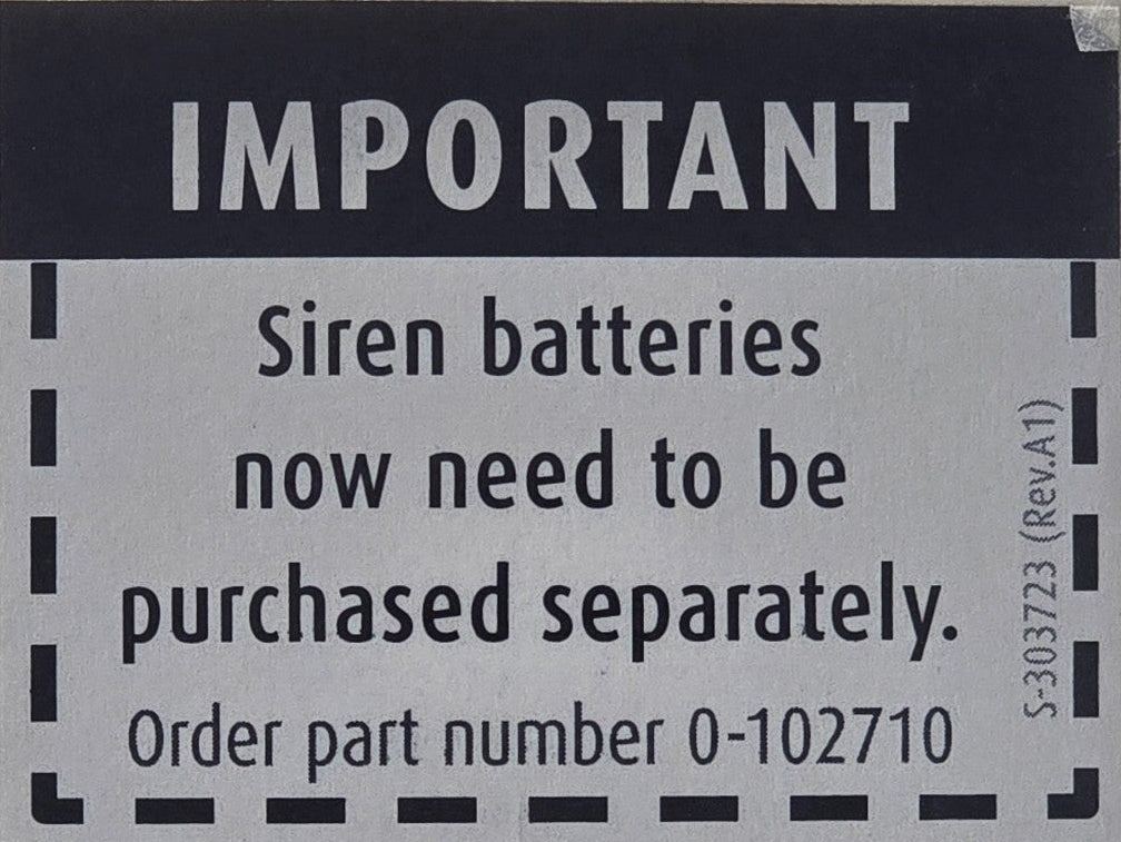 Product packaging with a label indicating siren batteries need to be purchased separately.