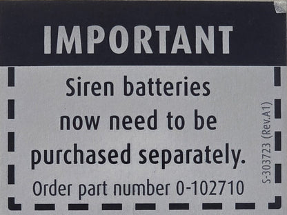 Product packaging with a label indicating siren batteries need to be purchased separately.